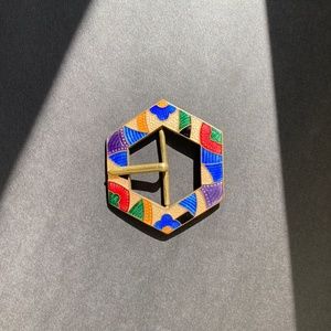 Multi-colored art deco enamel belt buckle.